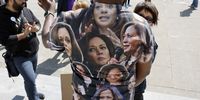 A supporter for Vice-President Kamala Harris with a shirt printed with images of Harris speaks to media during a rally in support of Kamala Harris for President in front of San Francisco City Hall, in San Francisco, California, USA, 22 July 2024. Chiu started 'Asians For Kamala' when Harris started in politics in San Francisco. US President Joe Biden announced on 21 July he would not seek re-election and endorsed Vice President Harris to be the Democratic Party's new nominee for the US elections in November 2024.  EPA-EFE/JOHN G. MABANGLO