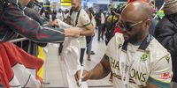 Temba Bavuma interacts with supporters during the South Africa men's national cricket team arrival at OR Tambo International Airport on June 18, 2025 in Johannesburg, South Africa. (Photo by Gallo Images/Alet Pretorius)