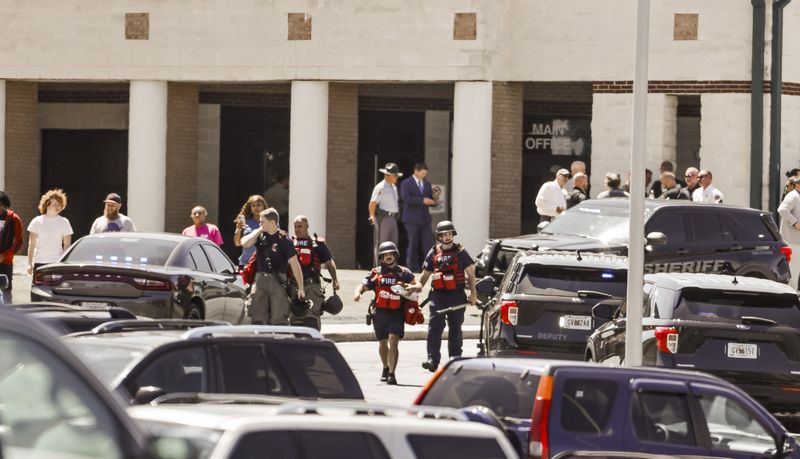 Georgia high school student, 14, kills 4 and wounds 9 in campus shooting