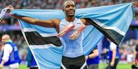 Gold medalist Letsile Tebogo of Botswana celebrates winning the Men's 200m Final on day thirteen of the Olympic Games Paris 2024 at Stade de France on 8 August 2024. (Photo: Andy Cheung/Getty Images)