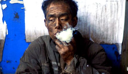 China, less impact by CO2 may explain slowing in warming