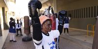 A boxing grannies punches the air as she trains during the twice weekly boxing grannies training session run by the 'A Team' gym in Cosmo City, Johannesburg, South Africa, 15 August 2024. The boxing grannies is the brain child of former body builder Claude Maphosa aka 'Coach', who started training the grannies in 2013. Many of them come to the training to keep fit and learn how to defend themselves. The ladies train twice a week for an two hours and the youngest grannie is 60 with the oldest being 86 years old. The boxing also helps the elderly with active aging, cardio and cognitive movement.  EPA-EFE/KIM LUDBROOK  ATTENTION: This Image is part of a PHOTO SET