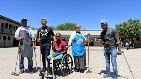 Disabled Dunoon residents roll up their sleeves after scoring contract to clean local school