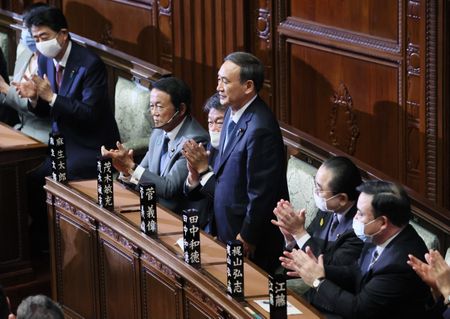 Japan's Suga crafts 'continuity cabinet' after voted prime minister