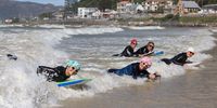 The Boogy Broads enjoying the surf at Muizenberg. Image: Nicky Elliott