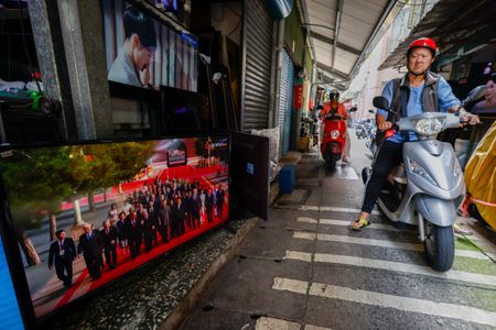 China says it 'absolutely will not' rule out use of force over Taiwan
