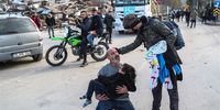  A man carries a girl who was rescued from the rubble of a collapsed building in Hatay, Turkey, 07 February 2023. Thousands of people died thousands more were injured after major earthquakes struck southern Turkey and northern Syria on 06 February. Authorities fear the death toll will keep climbing as rescuers look for survivors across the region.  EPA-EFE/ERDEM SAHIN