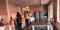 Volunteers help fix the premises to comply with health standards. (Photo: Naledi Sikhakhane)