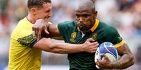 BORDEAUX, FRANCE - SEPTEMBER 17: Makazole Mapimpi of South Africa is tackled by Gabriel Rupanu of Romania during the Rugby World Cup France 2023 match between South Africa and Romania at Nouveau Stade de Bordeaux on September 17, 2023 in Bordeaux, France. (Photo by Alex Livesey/Getty Images)
