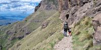 Hiking in the Drakensberg with Grandpa -  taken near the Sentinel in December 2022.</p>
<p>Jackie Cilliers