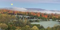 Moonset over autumn colours. Photographer: David McKerrow