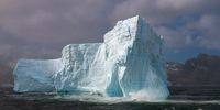 Iceberg in story seas of South Georgia. Photographer: Dieter Sellmeyer