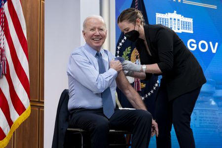 White House says Covid-19 booster campaign going well, should pick up