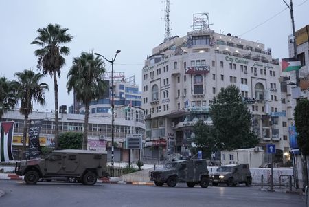 Israel says Al Jazeera offices ‘being used to incite terror’ after bureau raid