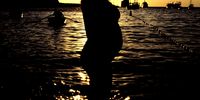 A pregnant ladys silhouette on the beach, Ibiza, 2004