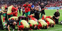 epa10352413 Players of Morocco perform Sujud, an act of thanks to Allah for winning, after the FIFA World Cup 2022 round of 16 soccer match between Morocco and Spain at Education City Stadium in Doha, Qatar, 06 December 2022.  EPA-EFE/Mohamed Messara