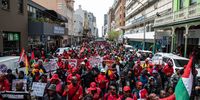 The South African Federation of Trade Unions (Saftu) march on Long Street to the Western Cape Provincial Legislature during the national shutdown march on August 24, 2022 in Cape Town, South Africa. The Congress of South African Trade Unions (Cosatu) issued a call to all workers and South Africans to join its national strike to address the rising living costs, unemployment, crime, load shedding and rising fuel prices. (Photo: Gallo Images/Daily Maverick/Victoria O'Regan)