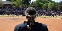 8 September 2019: An induna watched as the crowd left the stadium during Buthelezi’s speech. Prince Mangosuthu Buthelezi addressed a large gathering of people - mostly men from inner city hostels - whom he tried to dissuade from participating in what he called "purely xenophobic" violence. The crowd did not repsond well and went on the rampage. Two people were killed. Malvern, Johannesburg. Picture: James Oatway.