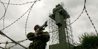 A paratrooper at a British Army watchtower in South Armagh. (Credit: EPA/Paul Mcerlane)