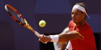 Rafael Nadal of Spain in action during the Men's Singles second round match against Novak Djokovic of Serbia at the Tennis competitions in the Paris 2024 Olympic Games, at the Roland Garros in Paris, France, 29 July 2024.  EPA-EFE/FRANCK ROBICHON
