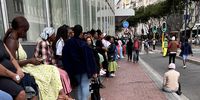 A queue outside the Golden Acre, Cape Town, on Tuesday 4 March 2025 as people wait in line to be helped at a Postbank pop-up. Sassa grant recipients have to migrate from their gold cards to new black cards. (Photo: Suné Payne)