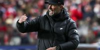 epa09872495 Liverpool head coach Jurgen Klopp reacts during the UEFA Champions League quarter final, first leg soccer match between SL Benfica and Liverpool FC at Luz Stadium, Lisbon, Portugal, 05 April 2022.  EPA-EFE/JOSE SENA GOULAO