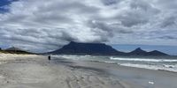 Volcanic clouds: Table Mountain from the beach at Woodbridge Island 4 January 2023. Photographer: Shaada Reddy