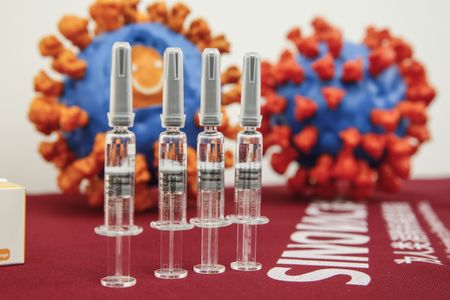 China in talks with WHO over assessing its Covid-19 vaccines for global use
