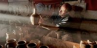 "A Potter". Visiting a small village near Göreme I found him, surrounded by clay pots, from which he makes a living. © Teodor Toma, Romania, Winner, National Awards, Portraiture, 2022 Sony World Photography Awards