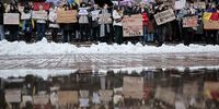People take part in a rally near the city administration in  Kyiv, Ukraine, 14 December 2023. The protesters are demanding to increase spending on defense from the local budget.  EPA-EFE/Oleg Petrasyuk