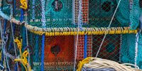 epa08016260 A general view of Lobster traps onboard a small scale fishing vessel in Kalk Bay harbour, Cape Town, South Africa 22 November 2019. Small-scale fishers of the Western Cape have for the first time been granted access to fishing during the 2019/20 west coast rock lobster season as part of the transition to the new small-scale fishing sector. This was announced by the South African Minister of Environment, Forestry and Fisheries, Barbara Creecy on 13 November 2019 following a series of stakeholder workshops with fishing communities in the Western Cape. Small scale fishermen in Kalk Bay and other fishing communities along South Africa's 2,850 kilometre coastline have been engaged in an ongoing negotiations for years with Department of Agriculture, Forestry and Fisheries (DAFF) on the implementation of the Small-scale Fisheries Policy and Fishing Rights Allocation Process (FRAP). Small scale fishermen in South Africa complain of being marginalised in favour of industrial fishing fleets by government. The fishermen are asking government to reconsider the allocation of rights to ensure their livelihoods as at present they do not have a fair share of the rights allocated according to leaders of the small scale fishing communities.  EPA-EFE/NIC BOTHMA