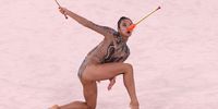 TOKYO, JAPAN - AUGUST 06: Laura Zeng of Team United States competes during the Individual All-Around Qualification on day fourteen of the Tokyo 2020 Olympic Games at Ariake Gymnastics Centre on August 06, 2021 in Tokyo, Japan. (Photo by Jamie Squire/Getty Images)