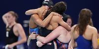 NANTERRE, FRANCE - AUGUST 04: Regan Smith, Lilly King, Gretchen Walsh and Torri Huske of Team United States celebrate after winning gold in a world record time in the Women's 4x100m Medley Relay Final on day nine of the Olympic Games Paris 2024 at Paris La Defense Arena on August 04, 2024 in Nanterre, France. (Photo by Quinn Rooney/Getty Images)