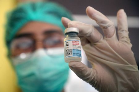 Britain first to approve Omicron-adapted Covid-19 shot