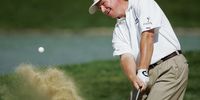 Ernie Els of South Africa plays from a bunker on the 14th hole during the final round of The Omega European Masters at Crans-Sur-Sierre Golf Club on September 5, 2004 in Crans Montana, Switzerland.  (Photo by Andrew Redington/Getty Images)
