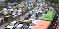 Commuters navigate through through a traffic jam due to water-logging after heavy monsoon rain in New Delhi, India, 28 June 2024. Monsoon arrived in the capital with heavy rainfalls that lashed the city in the morning, causing traffic disruptions in New Delhi.  EPA-EFE/MANISH JAIN