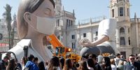 epa08285926 A Falla sculpture wearing a face mask at City Hall square after regional authorities postponed the Fallas festival due to coronavirus in the city of Valencia, eastern Spain, 11 March 2020. Las Fallas festivity, Intangible Cultural Heritage of Humanity, is held annually in Valencia to mark Saint Joseph, the patron of carpenters from 15 to 19 March. The fallas, installations of parodic huge papier-mache, cardboard and wooden sculptures, are burned on 19 March in the so-called 'Crema' to end the event.  EPA-EFE/Kai Foersterling  EPA-EFE/Kai Foersterling