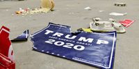TUPELO, MS - NOVEMBER 01: A torn sign lies on the ground after a "Keep America Great" campaign rally for President Donald Trump at BancorpSouth Arena on November 1, 2019 in Tupelo, Mississippi. Trump is campaigning in Mississippi ahead of the state's gubernatorial election where Republican candidate Tate Reeves is in a close race with Democrat Jim Hood. (Photo by Brandon Dill/Getty Images)