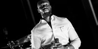 UNSPECIFIED  - SEPTEMBER 24: (EDITORS NOTE: This image has been converted to black and white.) Stormzy performs during Global Citizen Live on September 24, 2021 in Unspecified. (Photo by Jeff Spicer/Getty Images for Global Citizen)