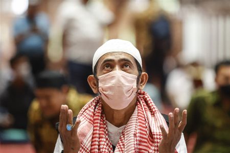 In images: Indonesian Muslims pray for the victims of the earthquake in Turkey and Syria