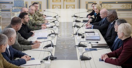 US defence secretary visits Kyiv to show solidarity; Poland decries exclusion from Berlin talks