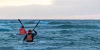 50 years, 244km and countless stories — gruelling surf ski race gets its own book