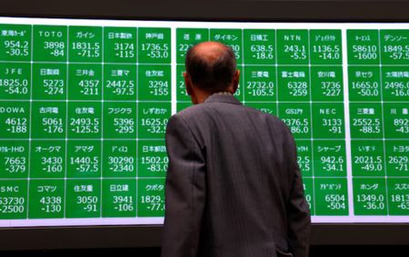 Stocks stabilise, gold hits record before Trump tariff reveal