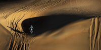 Dakar 2020 - Stage 11 - Shubaytah - Harad.  I took this series from a helicopter early in the morning during stage 11 of the 2020 Dakar Rally, which took entrants from Shubaytah to Harad. It was just after sunrise, which created this effect of light and shadow over the desert dunes. © Carlos López, Spain, Shortlist, Professional, Sport, 2021 Sony World Photography Awards