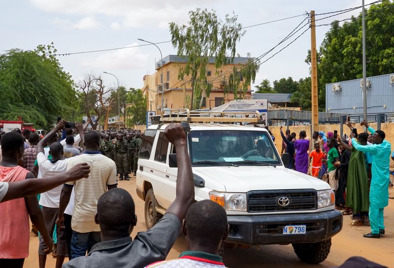 West Africa threatens force on Niger coup leaders, French embassy attacked
