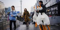  A man wearing a face mask sells toy ducks on the street in Beijing, China, 10 February 2023. According to the report on 10 February by the National Bureau of Statistics, China's Consumer Price Index (CPI), which is a main gauge of inflation, rose to 2.1 percent in January 2023 from 1.8 percent in previous month, compared with market forecasts of 2.2 percent. This was the highest reading in three months, as prices of food rised and those of non-food gained further following the Lunar New Year and the lift of COVID-19 measures.  EPA-EFE/WU HAO
