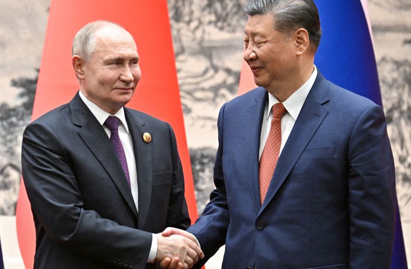 Xi, Putin pledge to fight US ‘containment’ efforts; Slovak leader stable after assassination attempt