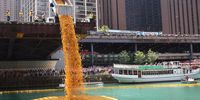 CHICAGO, IL - AUGUST 05: Rubber ducks are dropped into the Chicago River at the start of the Chicago Ducky Derby on August 05, 2021 in Chicago, Illinois. Derby organizers dropped 70,000 rubber ducks into the river to raise money for Special Olympics Illinois. Donors sponsored ducks in the derby for $5 each. The sponsor of the first duck to cross the finish line won a new SUV.  (Photo by Scott Olson/Getty Images)