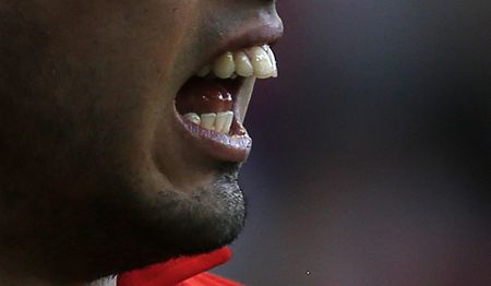 Soccer: Liverpool's Suarez gets 10-game ban for biting