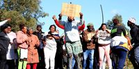 Grogro residents   protest on 15 October against the cutting of illegal electricity connections. (Photo: Deon Ferreira)